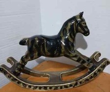 Espositore Cavallo a Dondolo